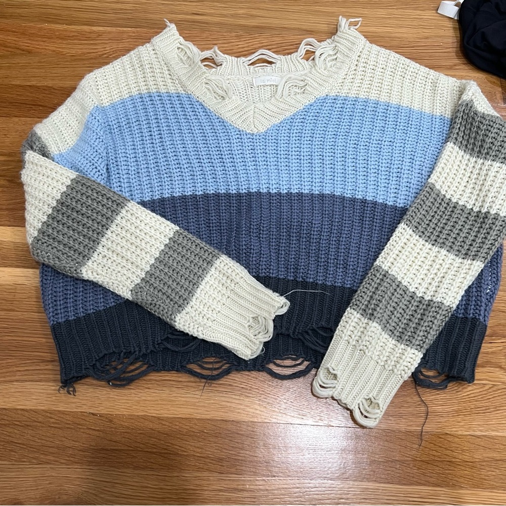 Ripped sweater
